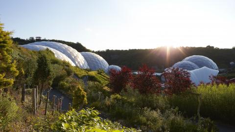 Early morning sun rising up over Eden Project Biomes